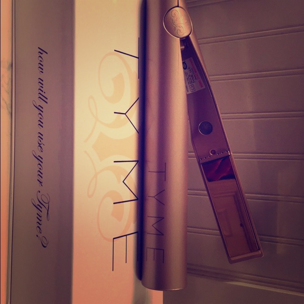 New in box Tyme iron. Used once