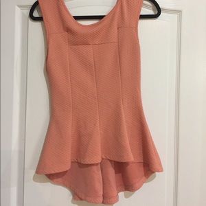 Peach high low shirt.