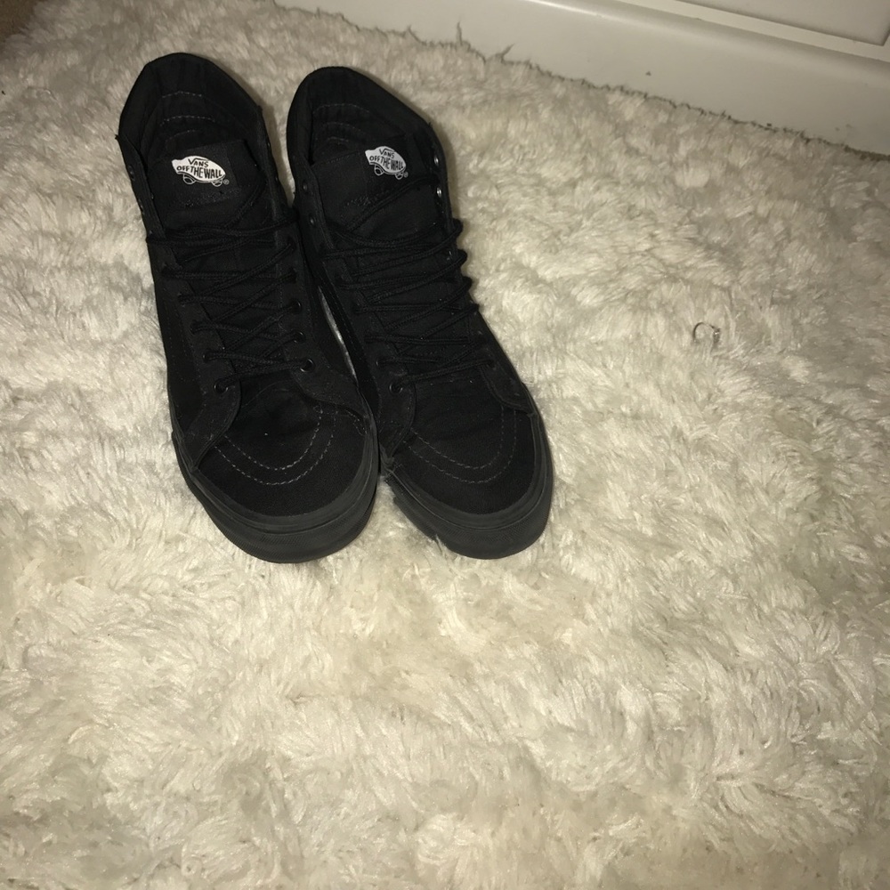 All black high top vans