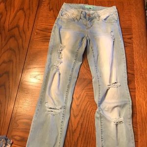 Distressed light wash jeans