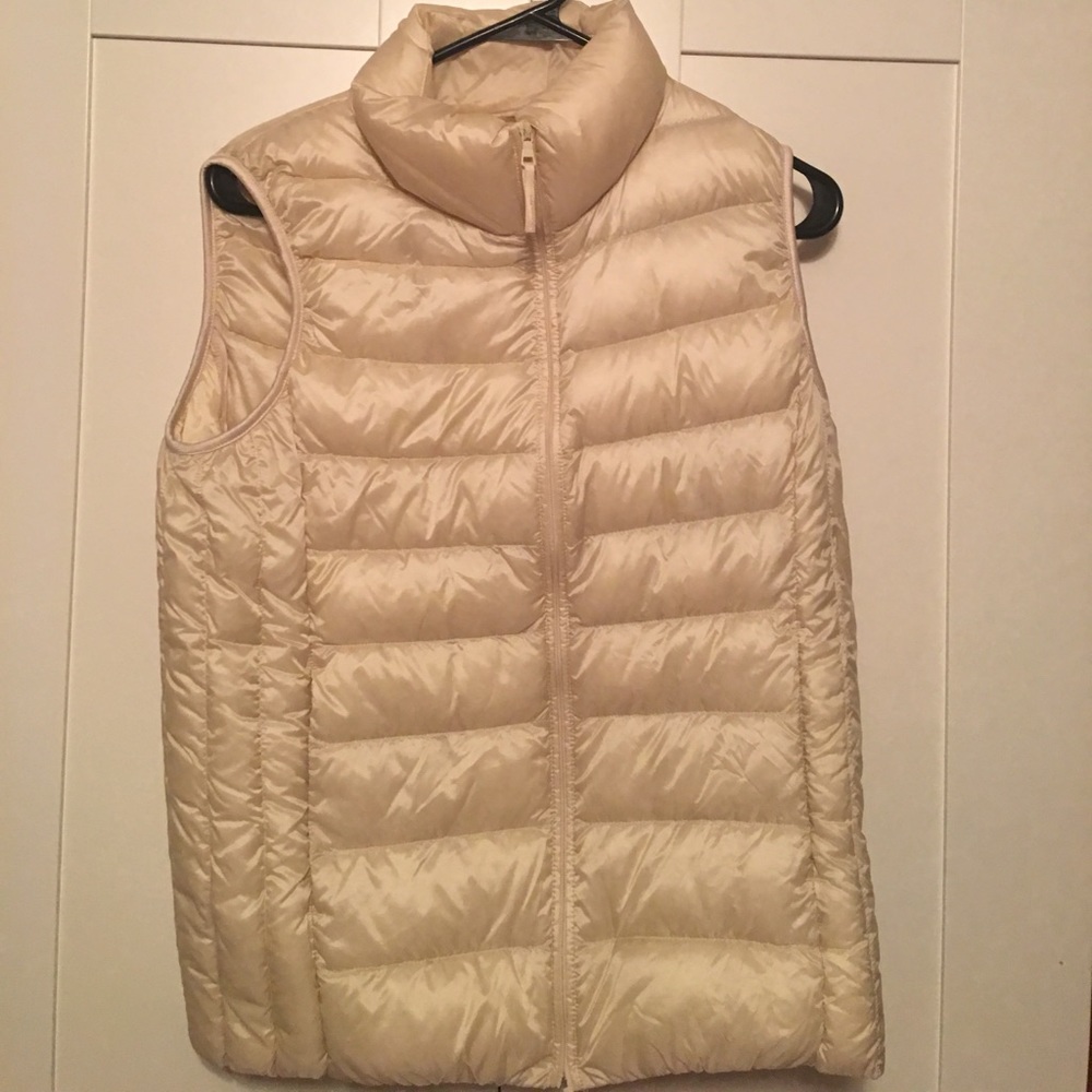 White/cream colored vest