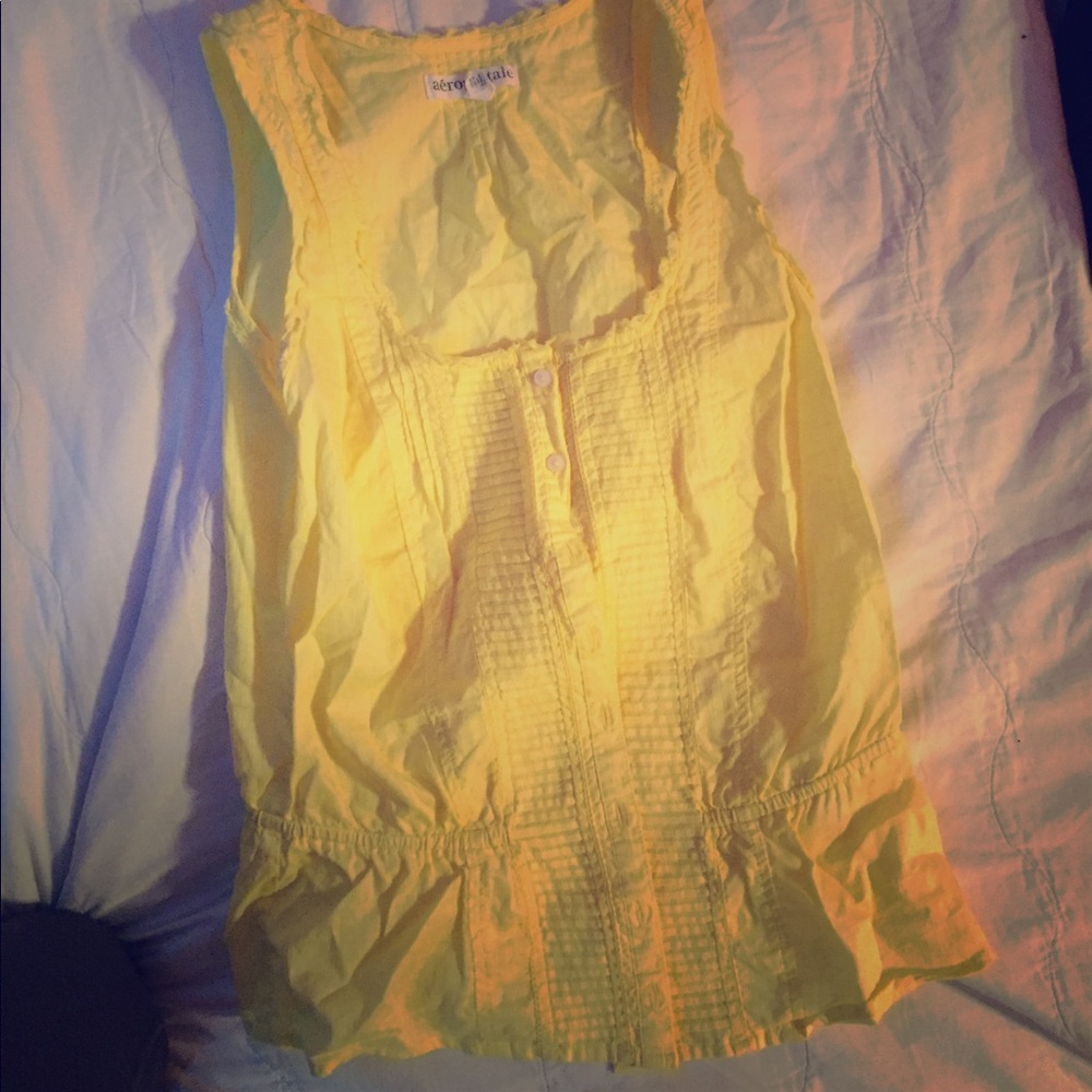 yellow button up tank