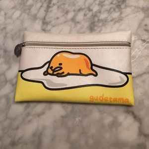 Adorable gudetama makeup bag