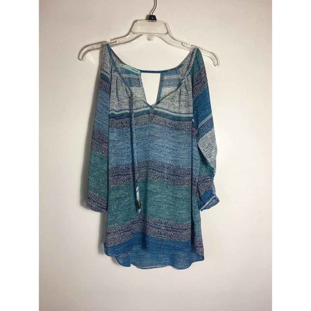 Tri-colored blouse.