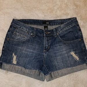 Dark wash distressed jean shorts