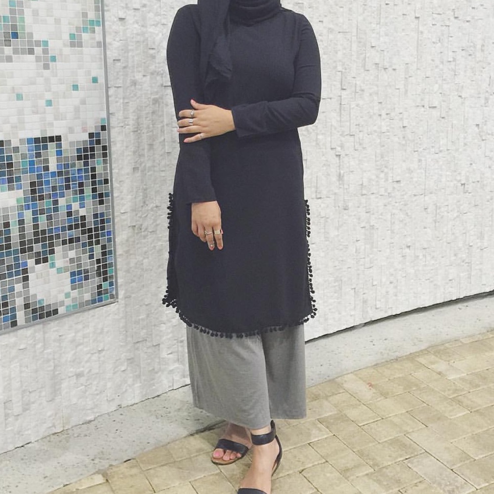 Long black shirt with balls