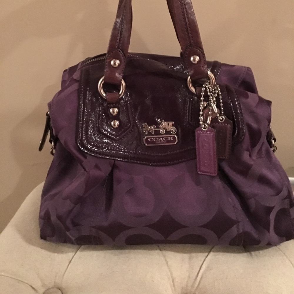 Exclusive purple coach handbag