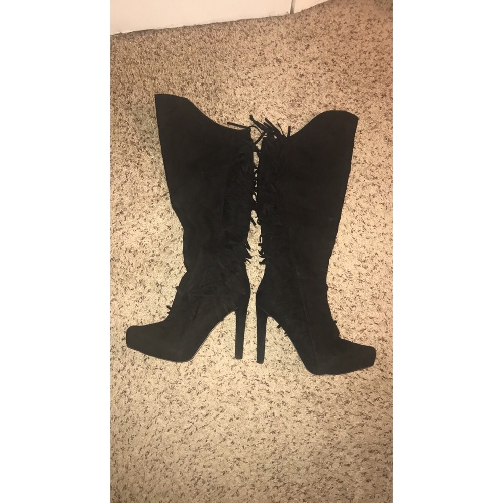Over the knee fringe boots