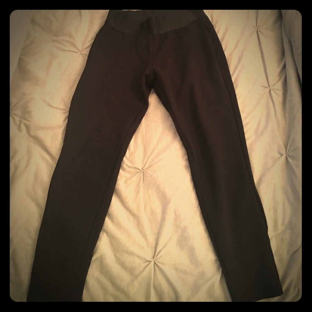 Bebe XS leggings with fake front and back pockets
