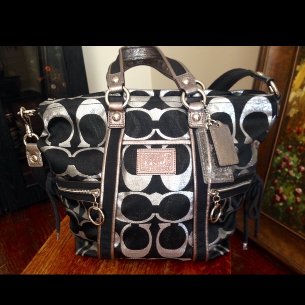 Silver and black coach purse