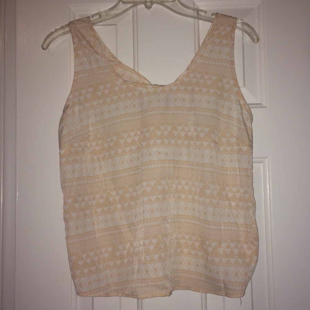 Tank with twist on back