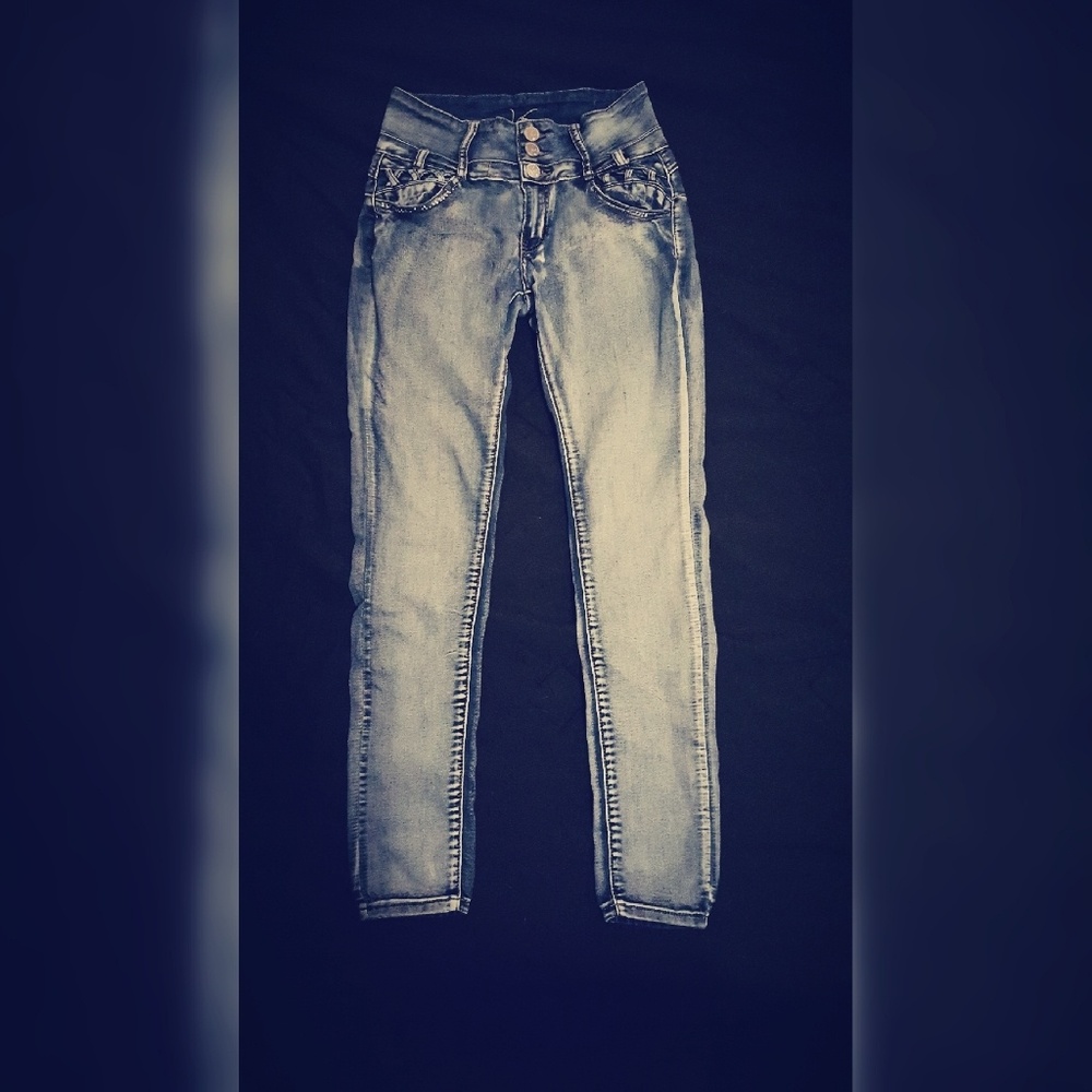 High waisted triple button skinny jeans