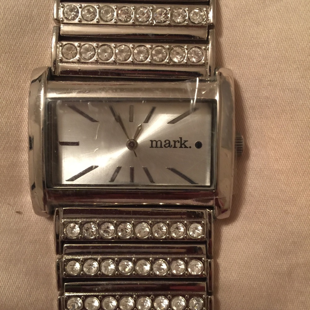 Mark. watch. Still has plastic on cover and back!