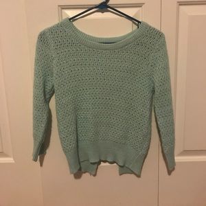 Delia's mint green sweater.