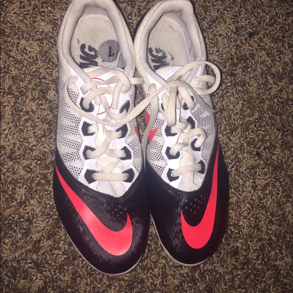 Pink,White, and Black track shoes