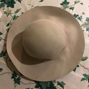 Gray felt hat with band above brim