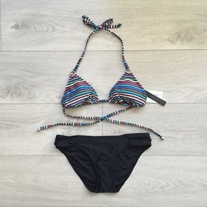 String bikini top with black bikini bottom