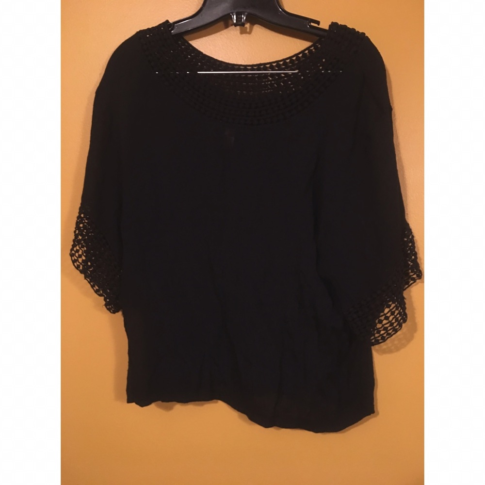 Black blouse with crocheted detail