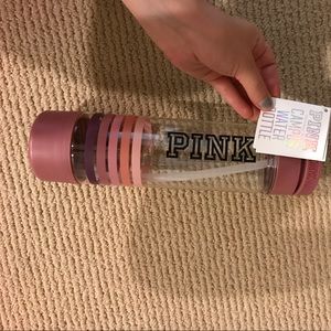 Brand new PINK water bottle with storage space