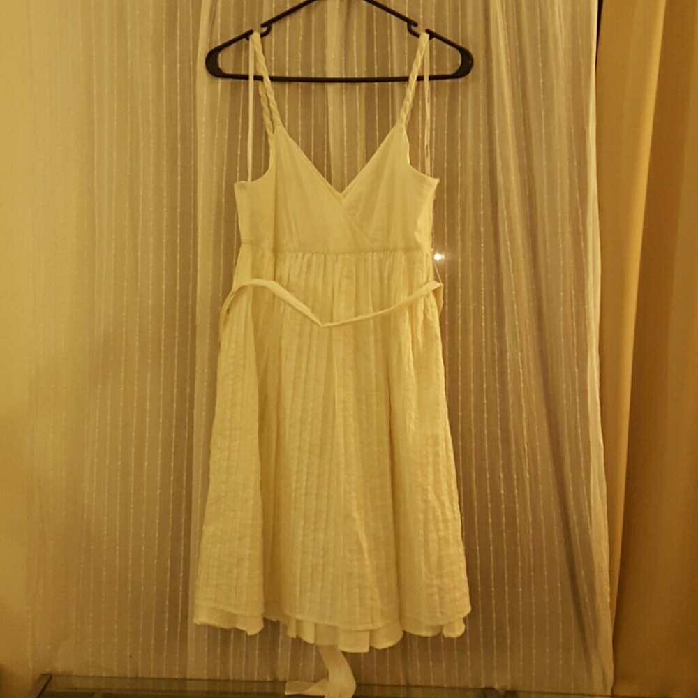 ivory CK sundress with empire waist & small pleats