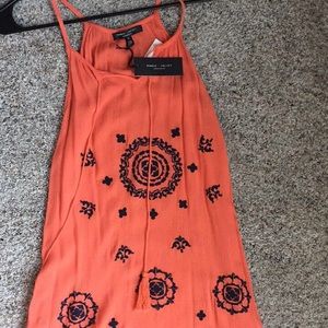 Women's Romeo & Juliet skinny strap tank top.