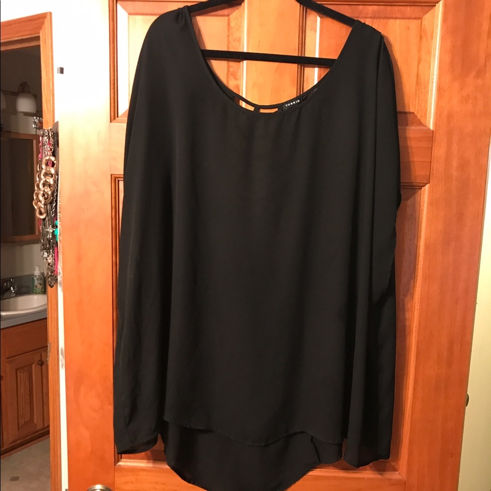 Cute, black top with dolman sleeve & cage back