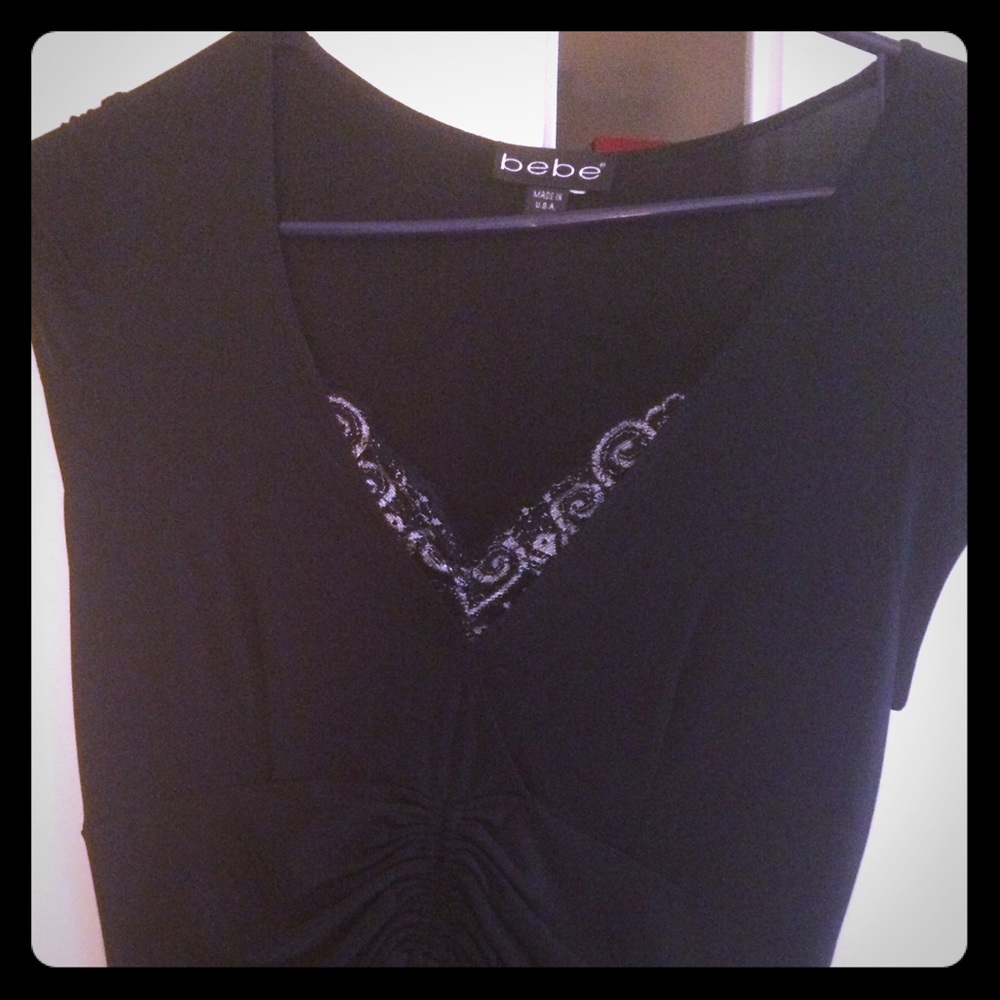 Bebe dress with lace in good condition. Fits well