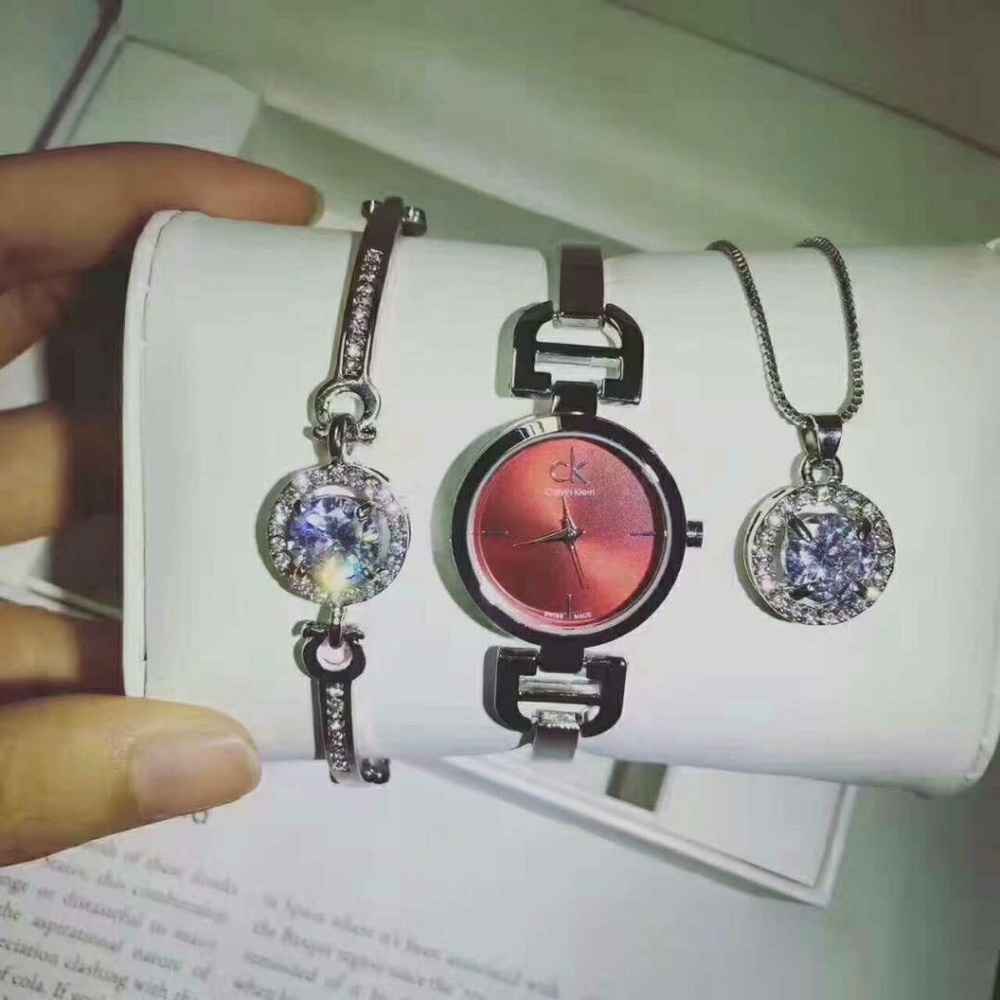 Female wrist watch, necklace and bracelet