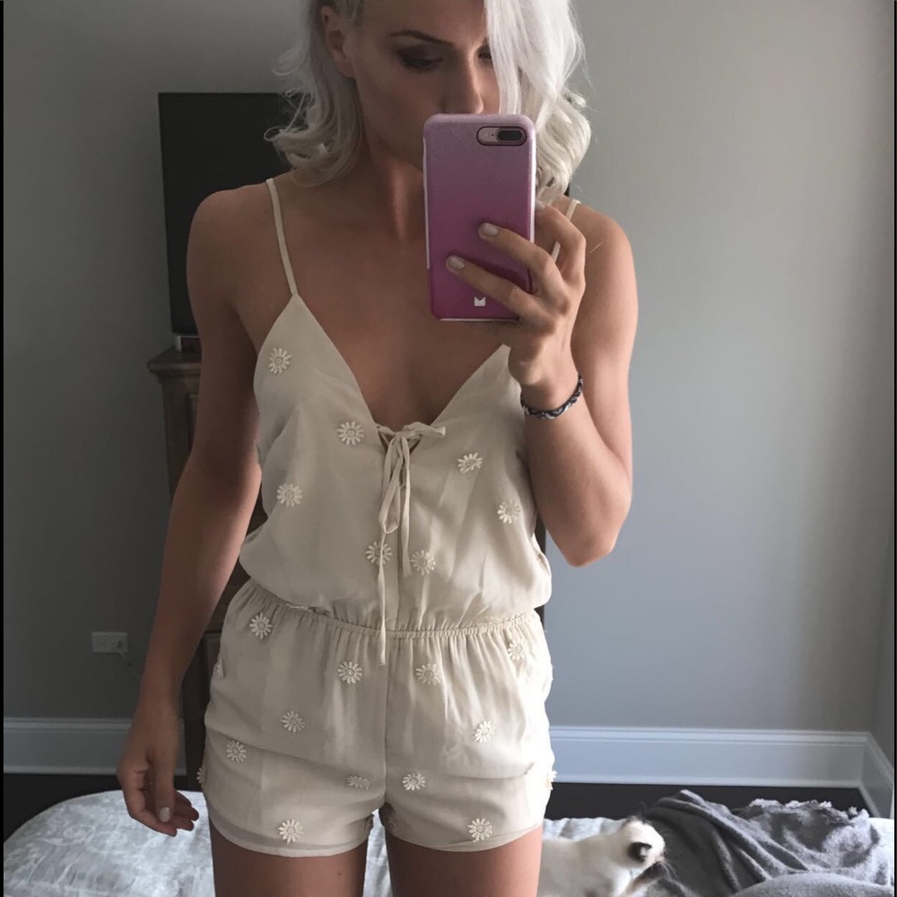 Beige or cream colored chiffon romper