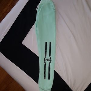 Pink brand mint green sweat pants.