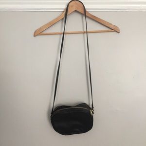 Black two pocket purse with strap