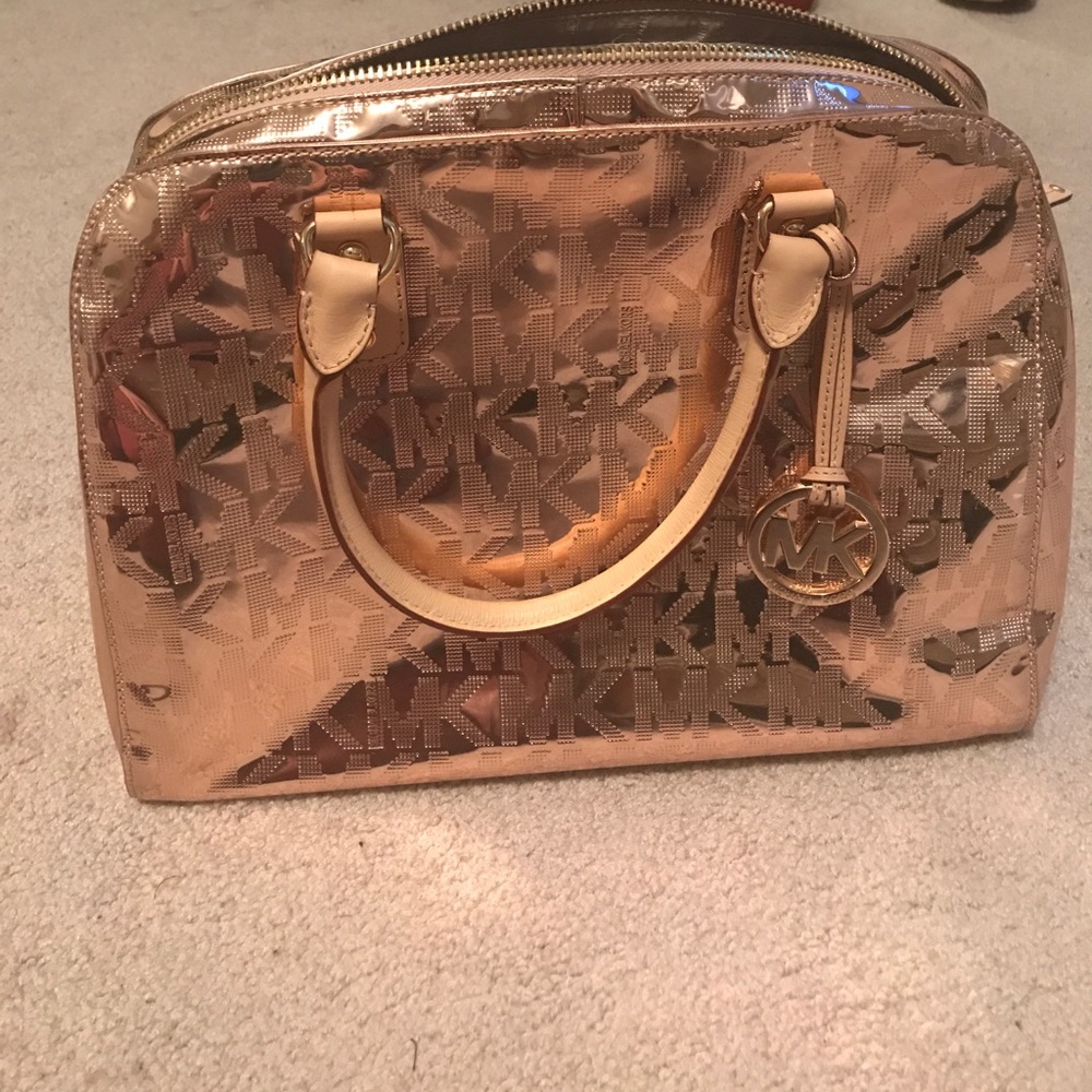 Michael Kors rose gold bowling purse