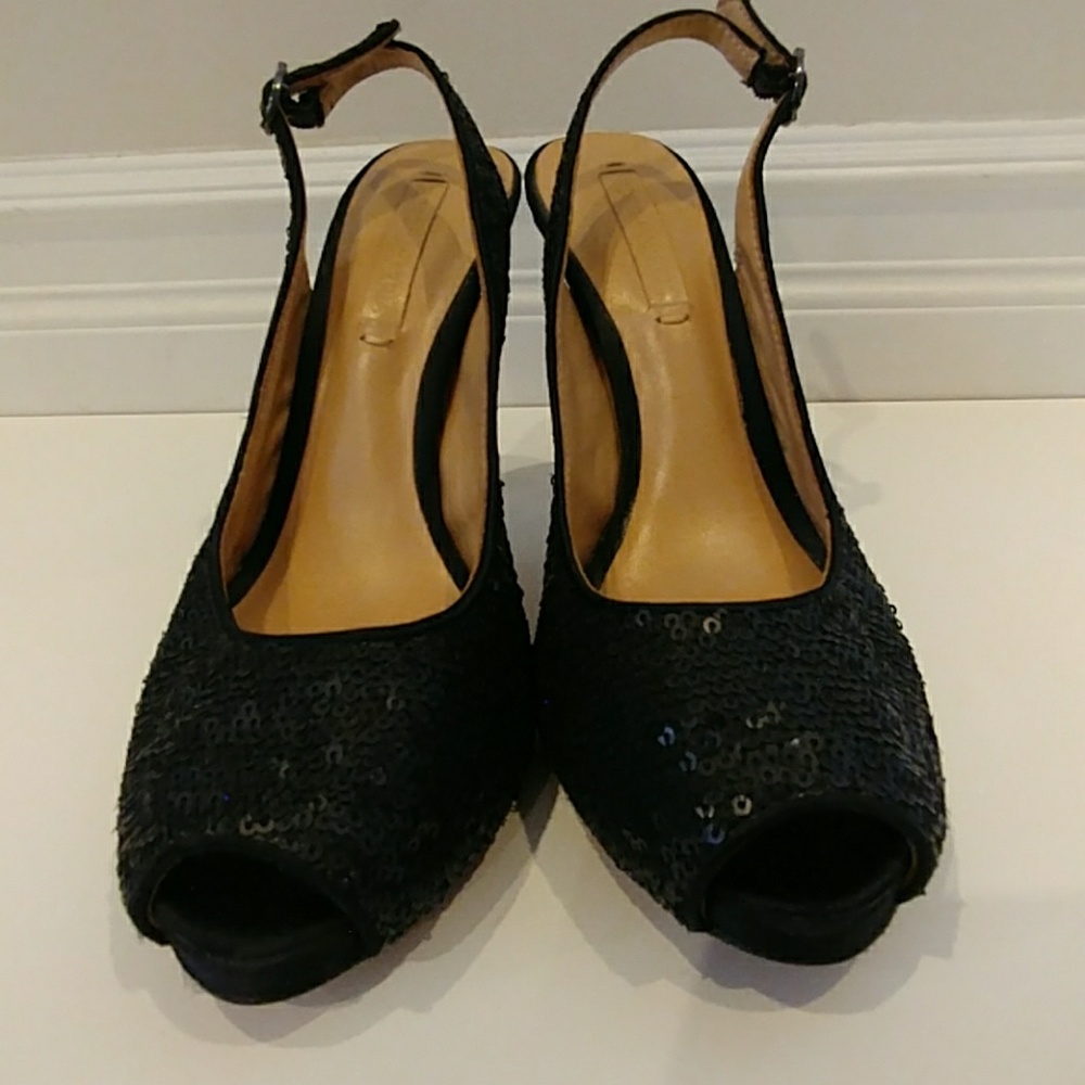 BCBGMaxAzria black sequin pumps.