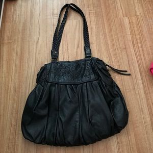 black leather floral embroidered large tote.