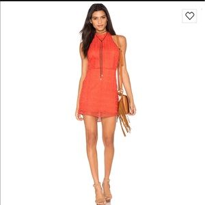 Gorgeous line and dot tangerine halter dress!