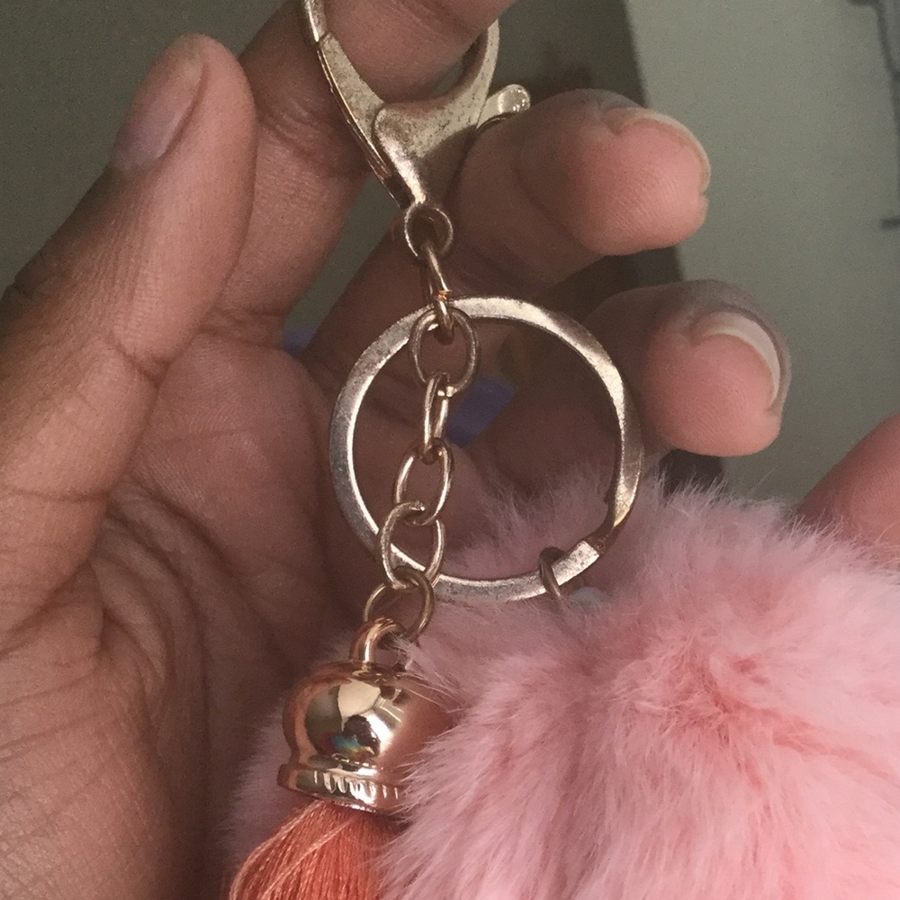 Cut little puff ball with tassel