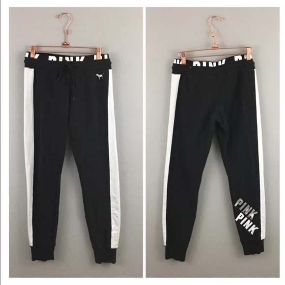 pink joggers with white stripe