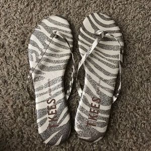 TKEES zebra print flip flops size 7