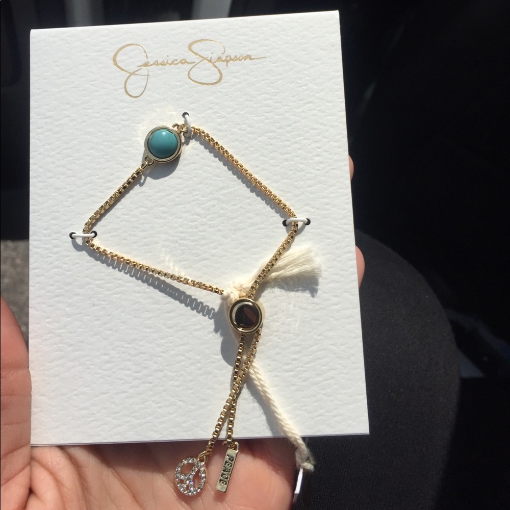 Jessica Simpson Gold "Peace" Bracelet