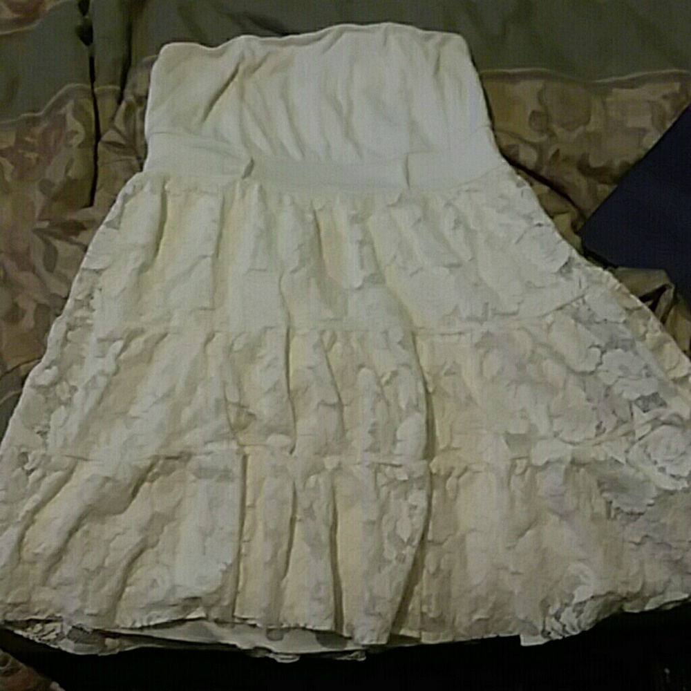 White strapless rue 21 dress with lace bottom.