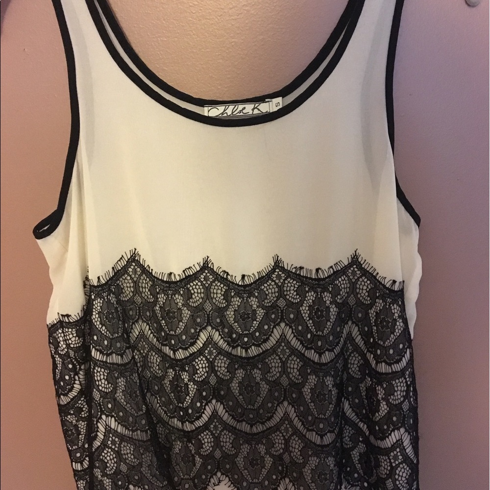 White silky loose fitting tank top with black lace