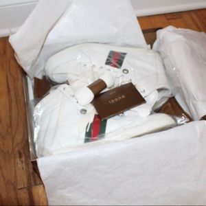 All white Gucci sneakers with red and green
