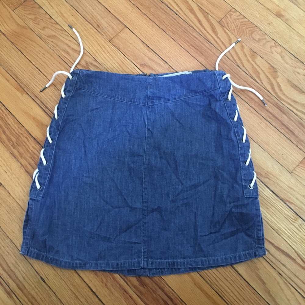 Denim skirt with cream lace up design