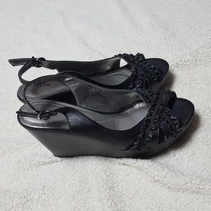 Black ruffle sandals