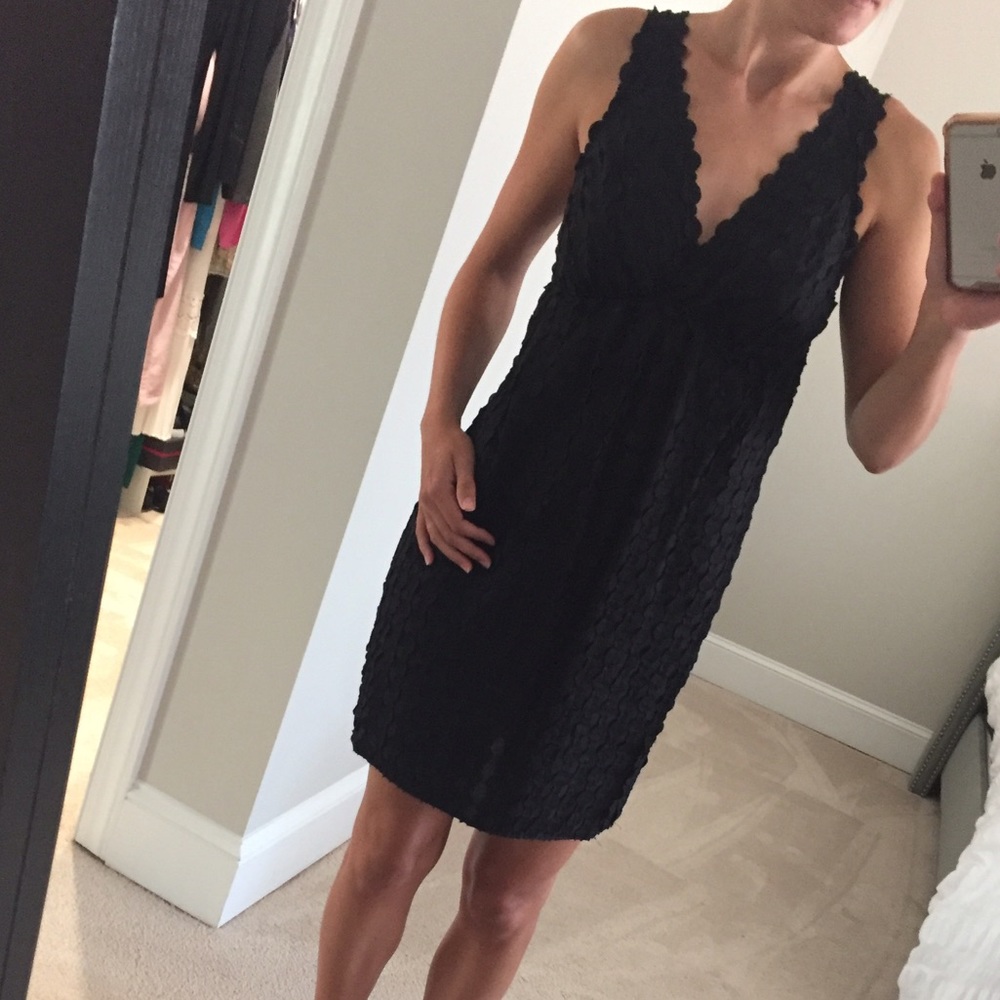 Max Studio LBD with circle detailing.