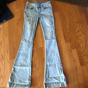 Light wash distressed jeans