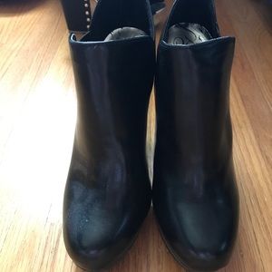 Zip back black heeled boots
