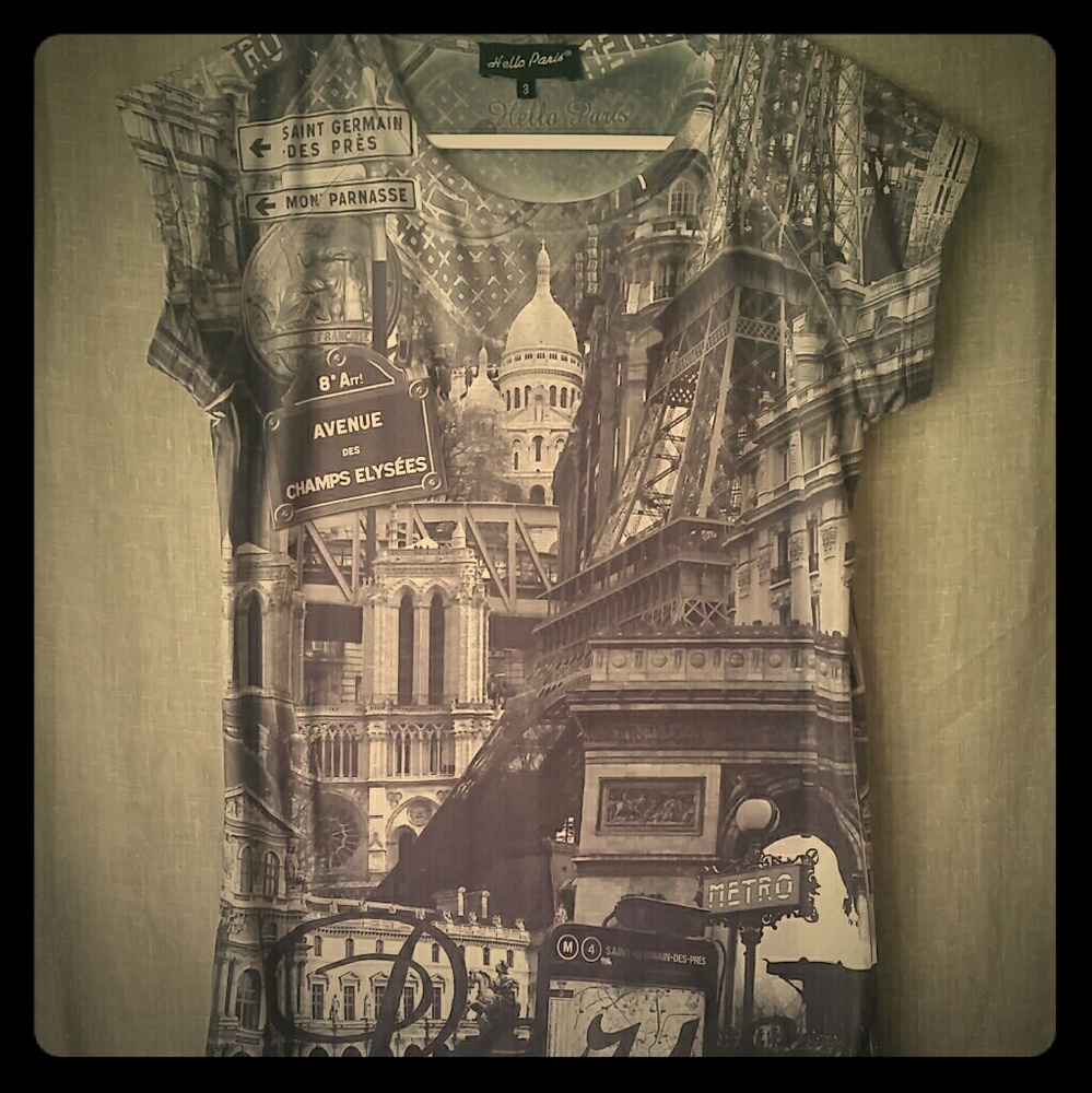 A white and gray short sleeve top