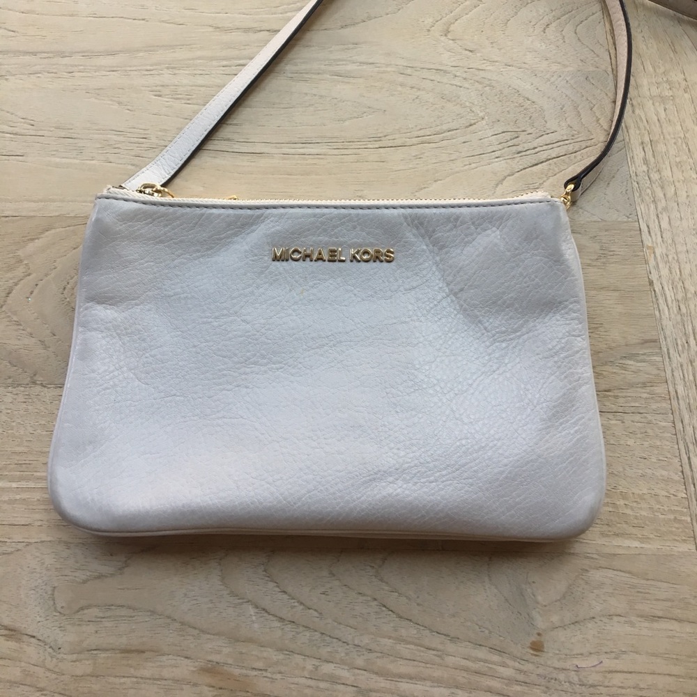 White Michael Kors triple zipper cross body