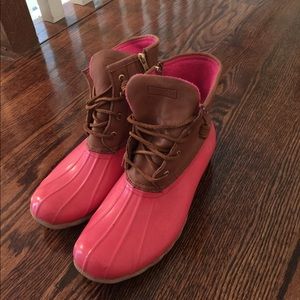Pink sperry duck boots.
